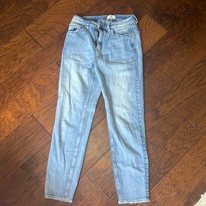 Slightly distressed light wash jeans